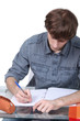 Photo: Male student at a desk Male student at a desk
