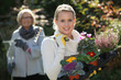 Young and old women gardening