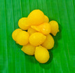 dessert thai on banana leaves.