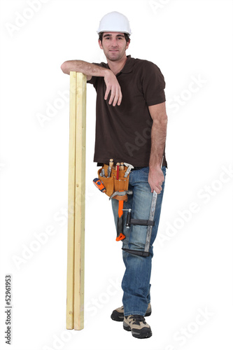 Photo: Builder with timber Builder with timber