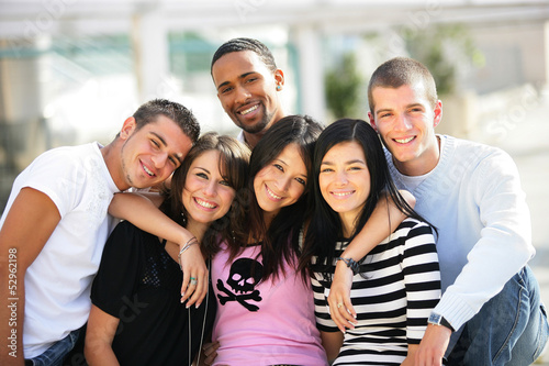 Photo: Young group of friends hanging out in the city Young group of friends hanging out in the city
