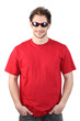Man dressed in a red t-shirt and wearing sunglasses