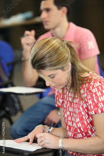 Photo: Student doing exam Student doing exam