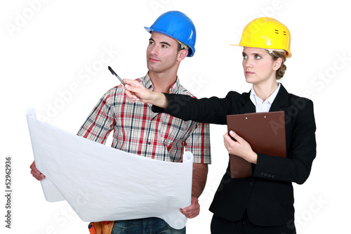 Photo: Foreman and architect discussing a project Foreman and architect discussing a project