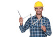 craftsman holding a meter