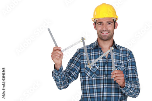 Photo: craftsman holding a meter craftsman holding a meter