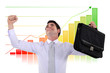 Jubilant businessman in front of a chart