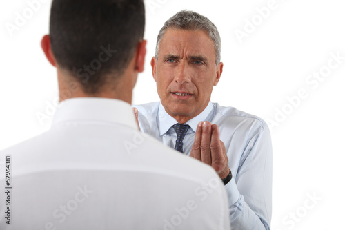 Photo: Boss dissatisfied with employee Boss dissatisfied with employee