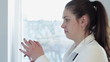 Young smiling female doctor with syringe, slow motion