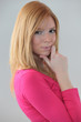Photo: portrait of young blonde looking puzzled portrait of young blonde looking puzzled
