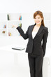 Photo: Beautiful young businesswoman working in office Beautiful young businesswoman working in office