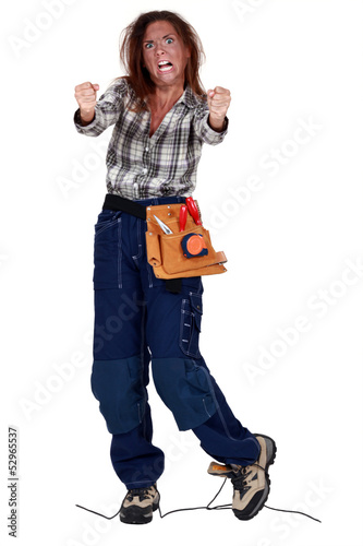 Photo: Raging female manual worker Raging female manual worker