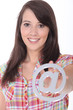 Young woman holding an @ sign