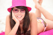 Photo: Girl wearing a sun hat Girl wearing a sun hat