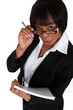 Photo: Businesswoman with notepad and pen Businesswoman with notepad and pen