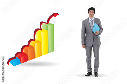 Photo: Businessman with an upward bar chart Businessman with an upward bar chart