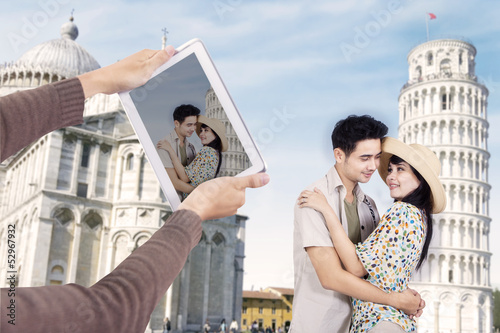 Photo: Asian couple at Pisa Tower Italy Asian couple at Pisa Tower Italy