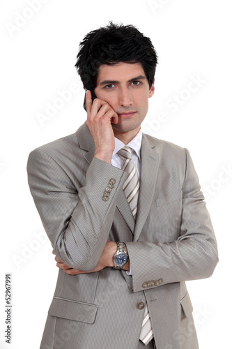 Photo: handsome businessman on the phone handsome businessman on the phone