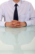 Photo: Man at desk awaiting interview Man at desk awaiting interview