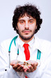 doctor holding coins in his hands