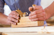 Hands working planer