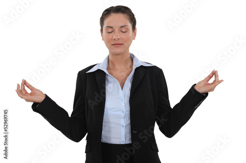 Photo: Executive woman staying Zen. Executive woman staying Zen.