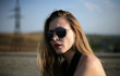 Sensual blonde girl with sunglasses