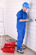 Photo: Man fitting an electric socket Man fitting an electric socket