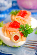 Foto: eggs with smoked salmon and red caviar eggs with smoked salmon and red caviar