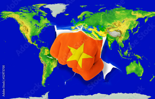 Photo: Fist in color national flag of vietnam punching world map Fist in color national flag of vietnam punching world map