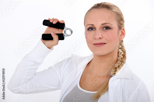 Photo: Young woman at the gym Young woman at the gym