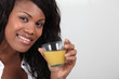 young woman drinking orange juice