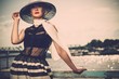 Foto: Woman in white hat and scarf Woman in white hat and scarf