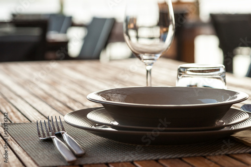 Photo: Ethnic tableware in a restaurant Ethnic tableware in a restaurant