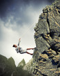 Photo: businesswoman climbing mountain businesswoman climbing mountain