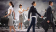 Businesswoman in blindfold among group of people