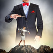 Businessman puppeteer