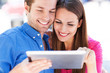 Couple Using Digital Tablet