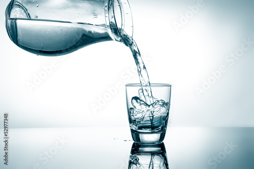 Photo: Filling in glass of water Filling in glass of water