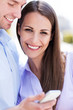 Young couple with mobile phone