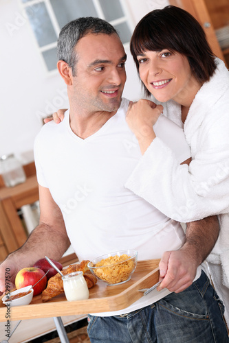 Photo: portrait of a couple at breakfast portrait of a couple at breakfast