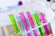 Chemistry laboratory glassware with colour liquids