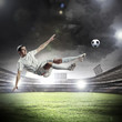 football player striking the ball