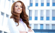 Photo: Young happy women or student on the property business background Young happy women or student on the property business background