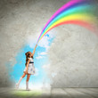Photo: Little girl drawing rainbow Little girl drawing rainbow
