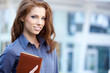 Young happy women or student on the property business background