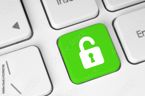 Illustration: Open lock green button on the keyboard, access concept . Open lock green button on the keyboard, access concept .