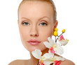 beautiful woman with orchid over white background