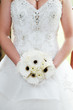 Brides bouquet and dress details