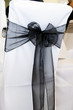 Black chair cover at wedding